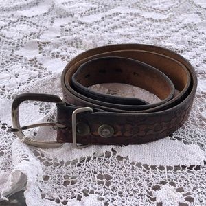 Vintage hand tooled leather belt. 46 1/2 long 38.5-42 in holes. 2 in buckle.